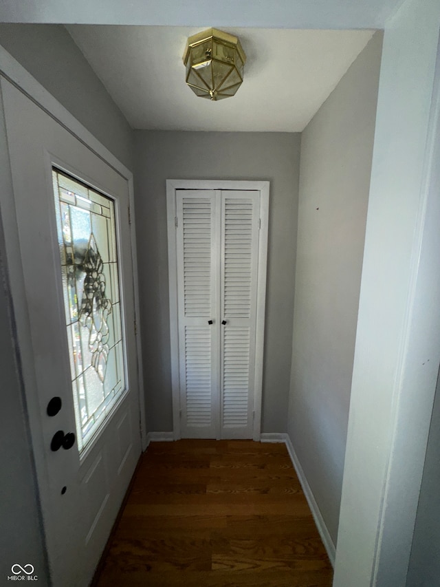 doorway to outside with dark hardwood / wood-style flooring