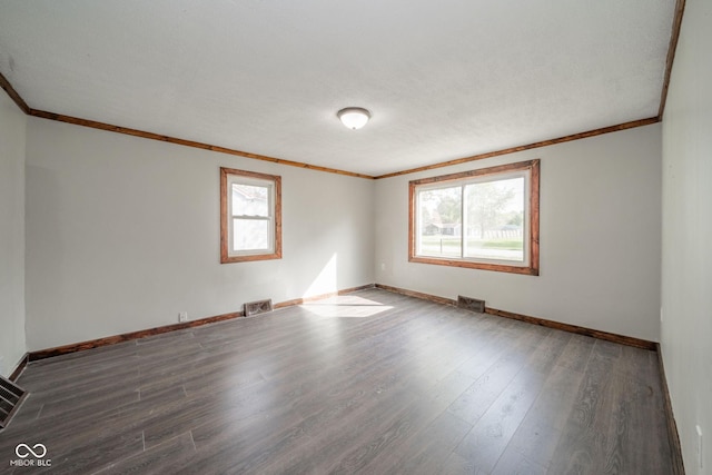 2682 E 150 S, Anderson, IN 46017 - empty room with crown molding, healthy amount of natural light, and wood finished floors