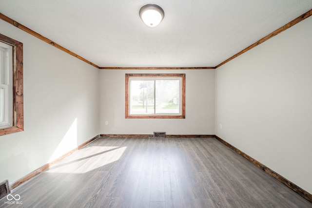 2682 E 150 S, Anderson, IN 46017 - empty room featuring light wood-style floors and crown molding