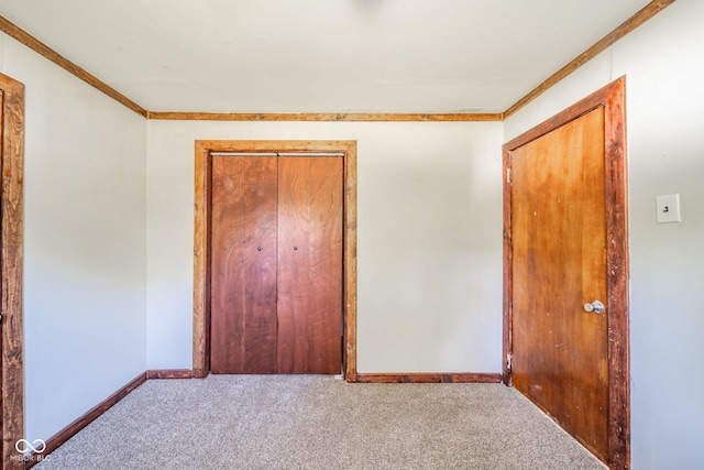2682 E 150 S, Anderson, IN 46017 - unfurnished bedroom with ornamental molding, carpet floors, and a closet