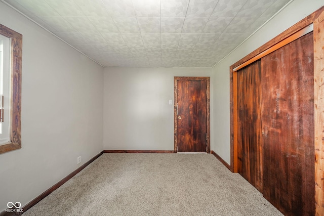2682 E 150 S, Anderson, IN 46017 - unfurnished bedroom featuring carpet and a closet
