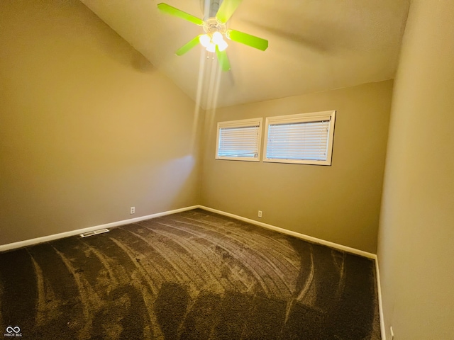 unfurnished room with carpet, lofted ceiling, and ceiling fan