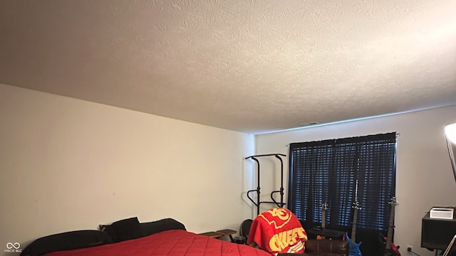 bedroom with a textured ceiling