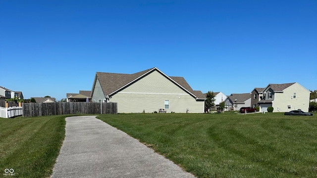 view of home's exterior featuring a lawn