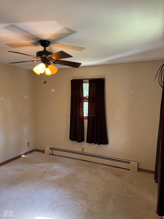 unfurnished room featuring ceiling fan, a baseboard radiator, and carpet flooring