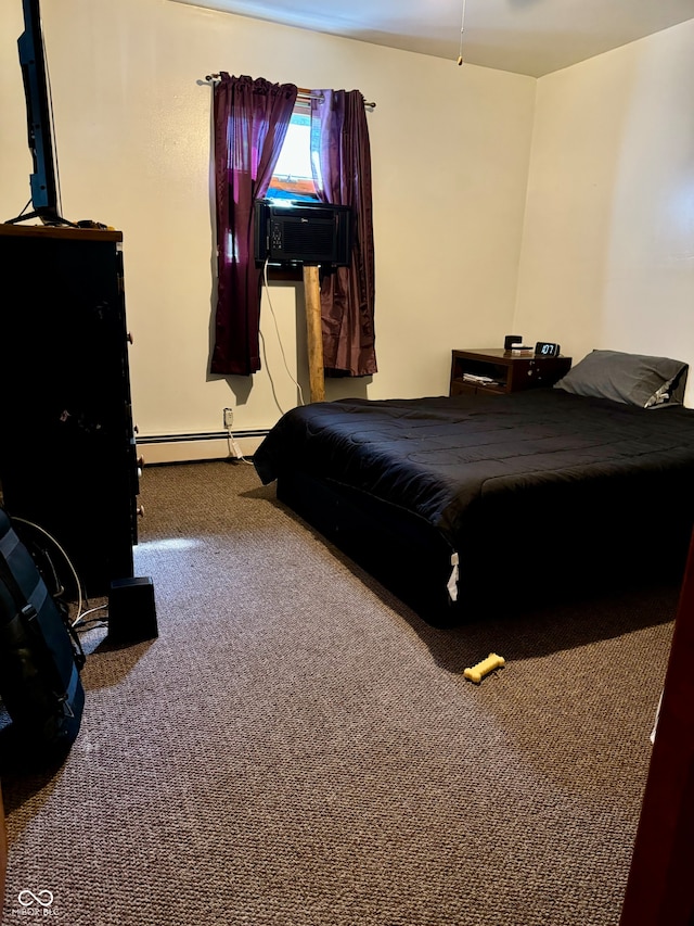 bedroom featuring carpet, baseboard heating, and cooling unit