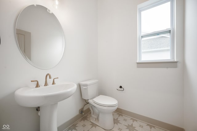 bathroom with sink and toilet