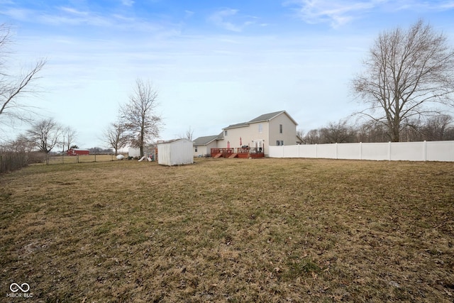 view of yard with a storage shed