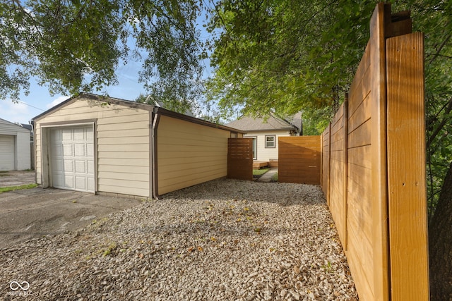 garage featuring wood walls