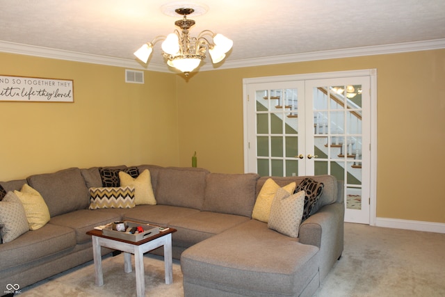 living room with crown molding, light carpet, french doors, and a notable chandelier