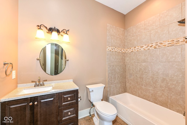 full bathroom with vanity, toilet, and tiled shower / bath combo