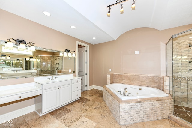 bathroom with separate shower and tub and vanity