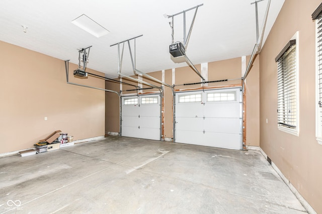 garage featuring a garage door opener