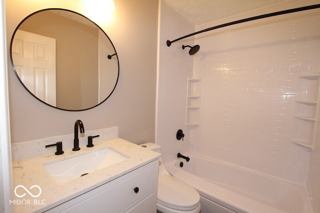 full bathroom with tub / shower combination, a textured ceiling, vanity, and toilet