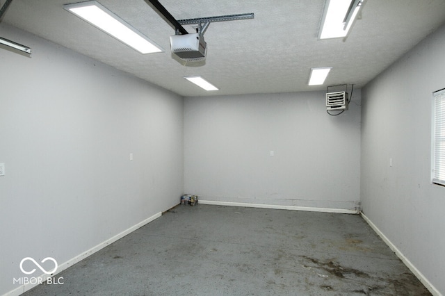 empty room featuring concrete floors and a textured ceiling