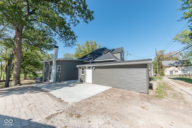 view of home's exterior featuring a patio