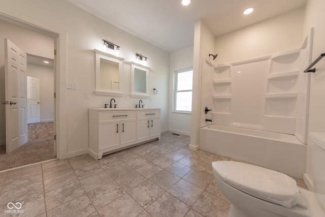 full bathroom with vanity, bathing tub / shower combination, and toilet