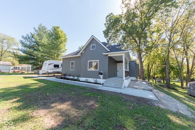 view of front of house with a front lawn