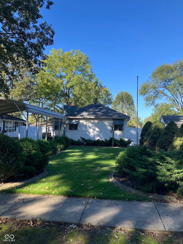 view of home's exterior featuring a lawn