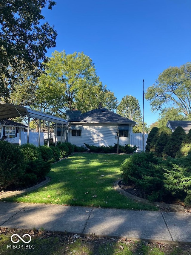 view of home's exterior featuring a yard