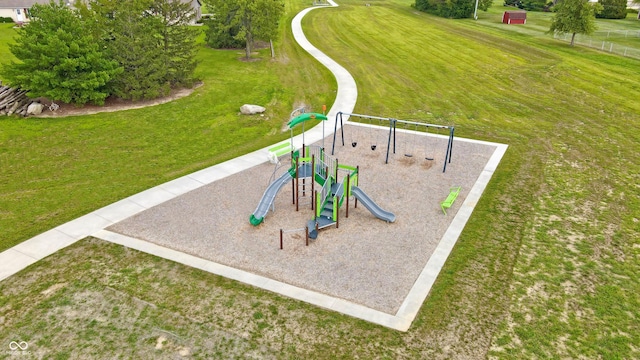 communal playground featuring a yard