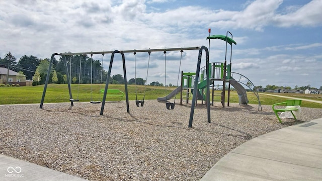 community jungle gym with a yard