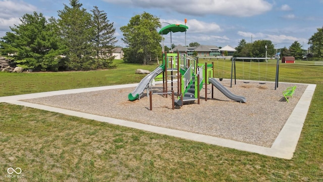 community play area with a lawn