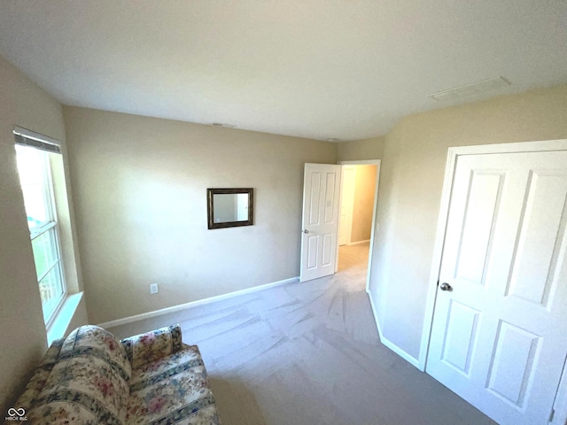 interior space with light colored carpet