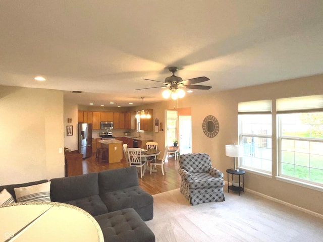 living room featuring ceiling fan