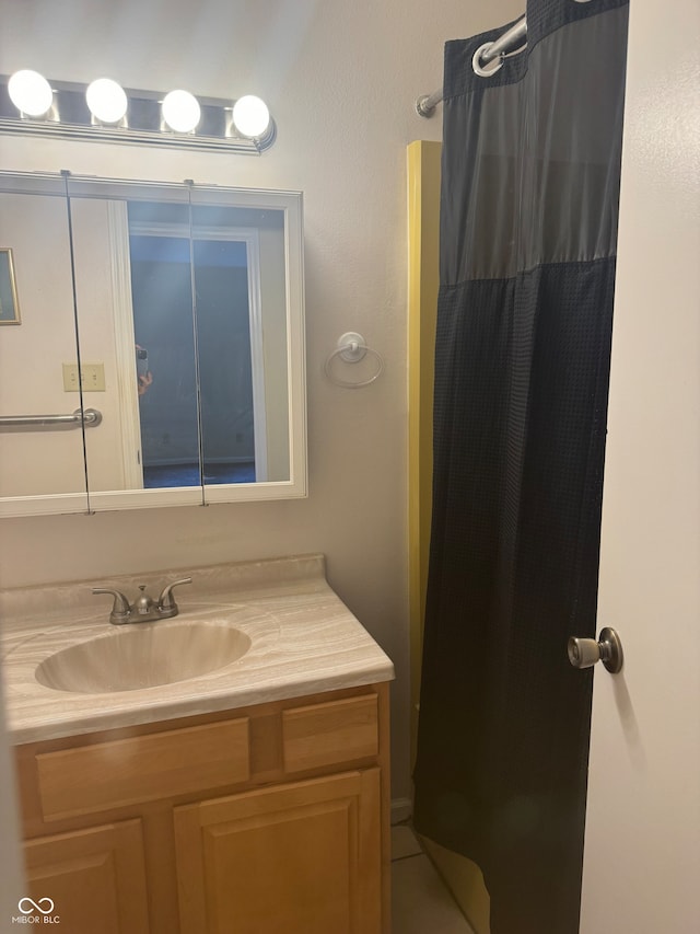 bathroom featuring vanity and walk in shower