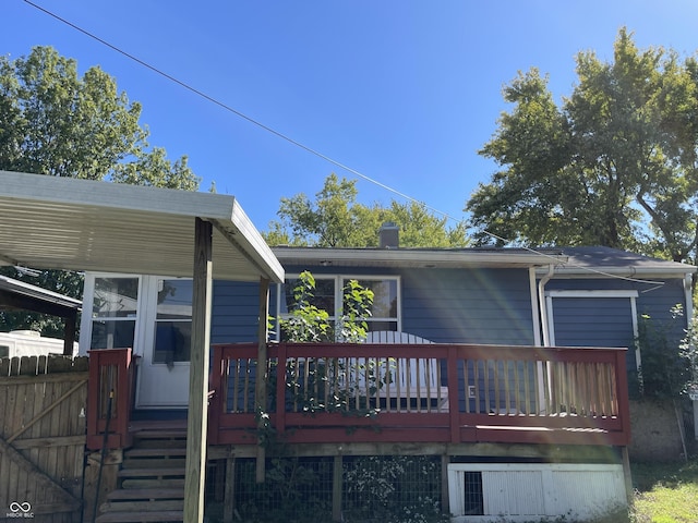 3991 Bennett Dr, Indianapolis, IN 46254 - back of property featuring a wooden deck