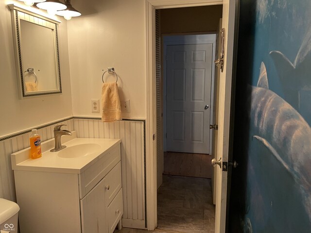 3991 Bennett Dr, Indianapolis, IN 46254 - bathroom with wainscoting and vanity