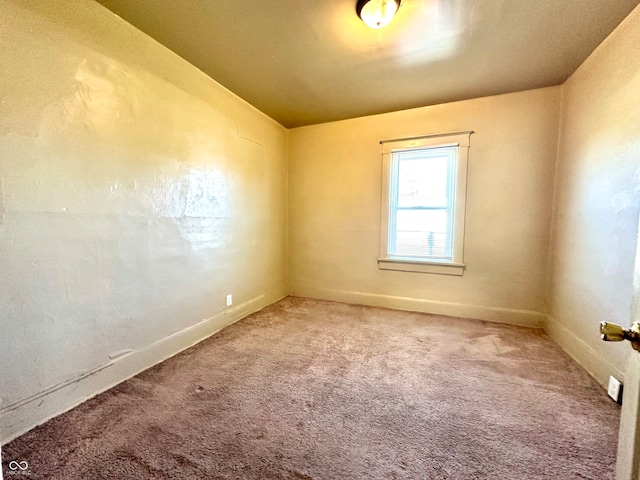 spare room with carpet flooring