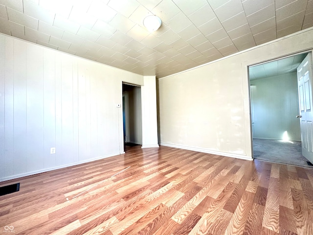 empty room featuring light hardwood / wood-style floors