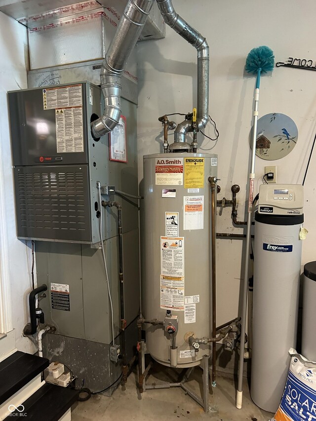 utilities featuring heating unit and gas water heater