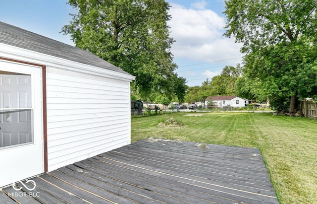 deck featuring a lawn