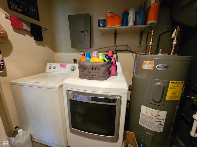 washroom with water heater, independent washer and dryer, and electric panel