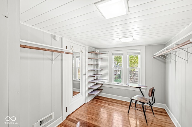 walk in closet featuring wood-type flooring