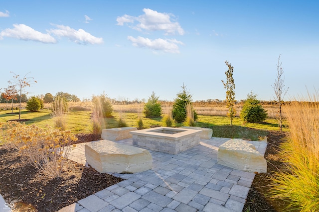 view of patio / terrace with a fire pit