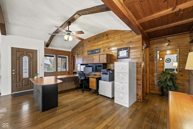 610 E Morgan St, Martinsville, IN 46151 - kitchen with dark wood-style floors, a peninsula, wooden walls, ceiling fan, and a textured ceiling