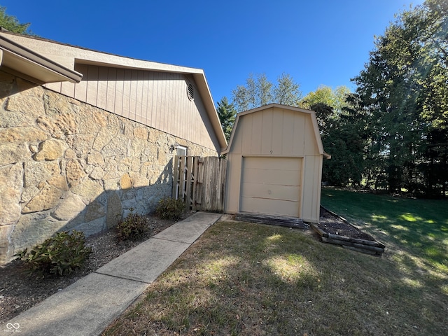 garage with a lawn