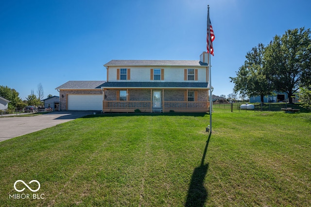 view of front facade with a garage, a porch, and a front lawn