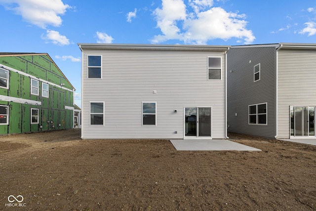 rear view of house featuring a patio area