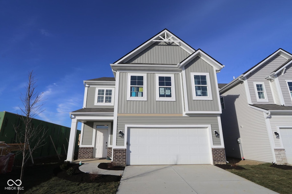 craftsman-style home with a garage