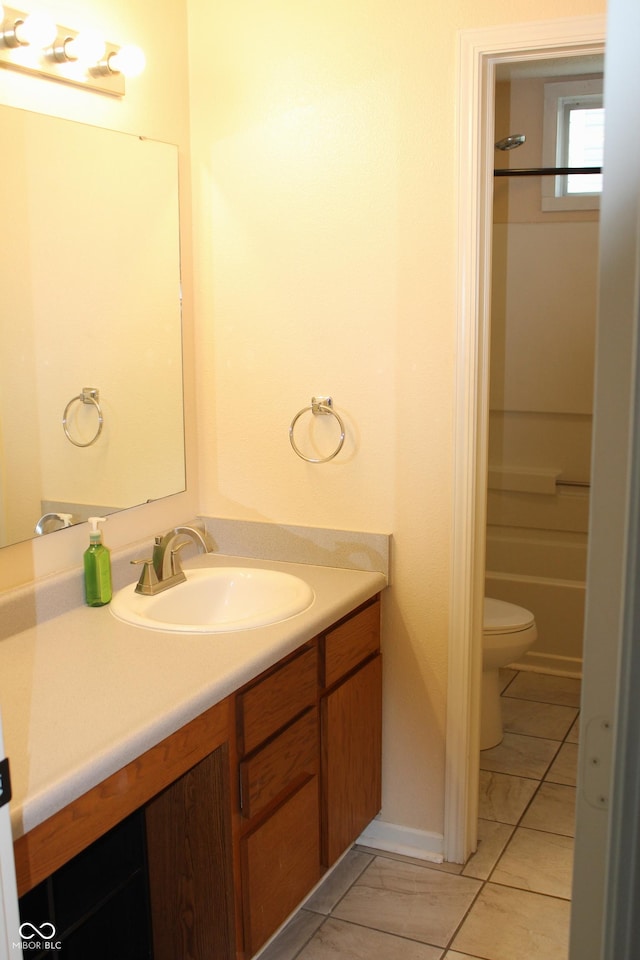 full bathroom featuring toilet, tile patterned flooring, shower / bath combination, and vanity