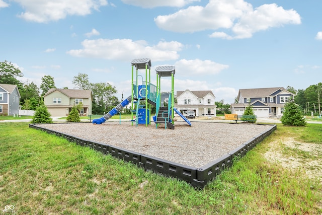 view of jungle gym featuring a lawn