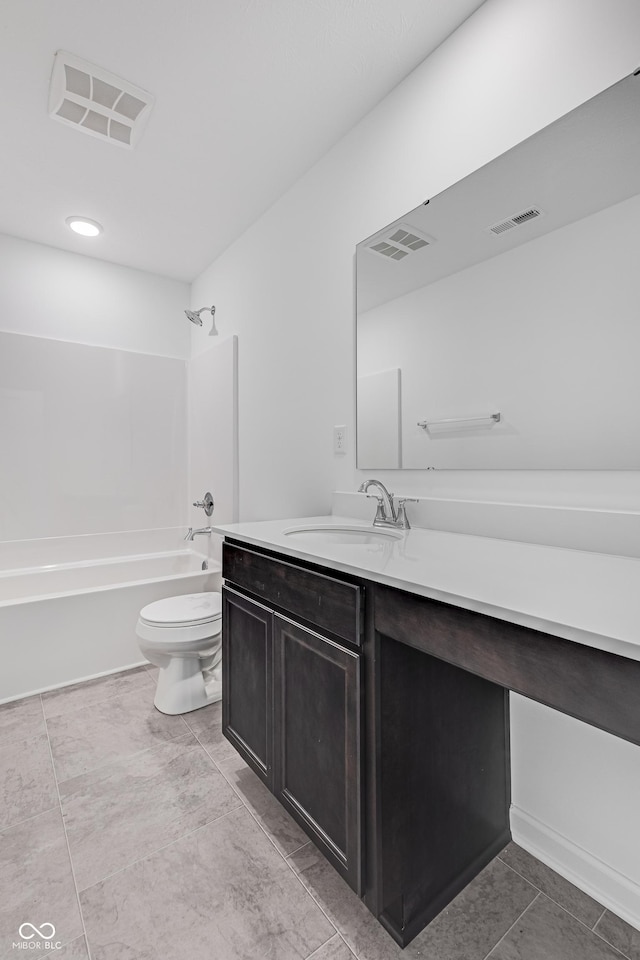 full bathroom featuring shower / bathing tub combination, vanity, and toilet