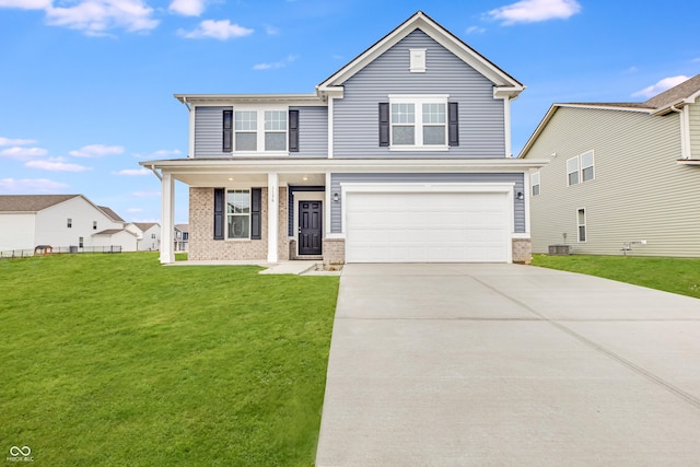 view of front facade with a garage and a front lawn