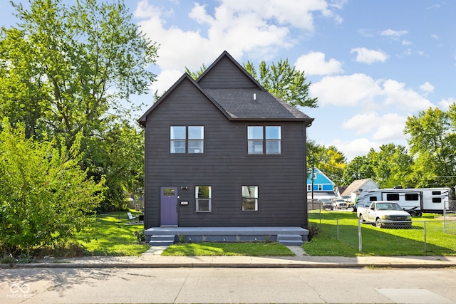 view of property exterior with a yard