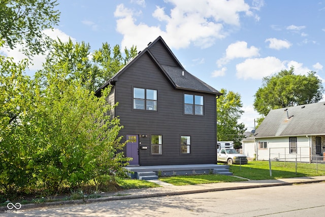 view of property exterior featuring a lawn